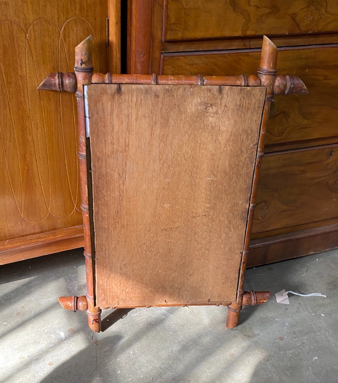 A late Victorian faux bamboo rectangular frame wall mirror, width 56cm, height 74cm